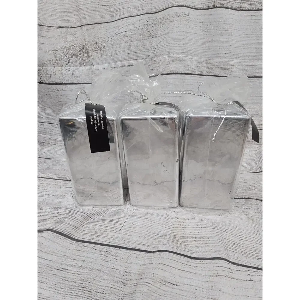 PIER 1 IMPORTS 2 UNSCENTED CANDLES METALLIC SILVER SQUARE 3 X 3 X 6